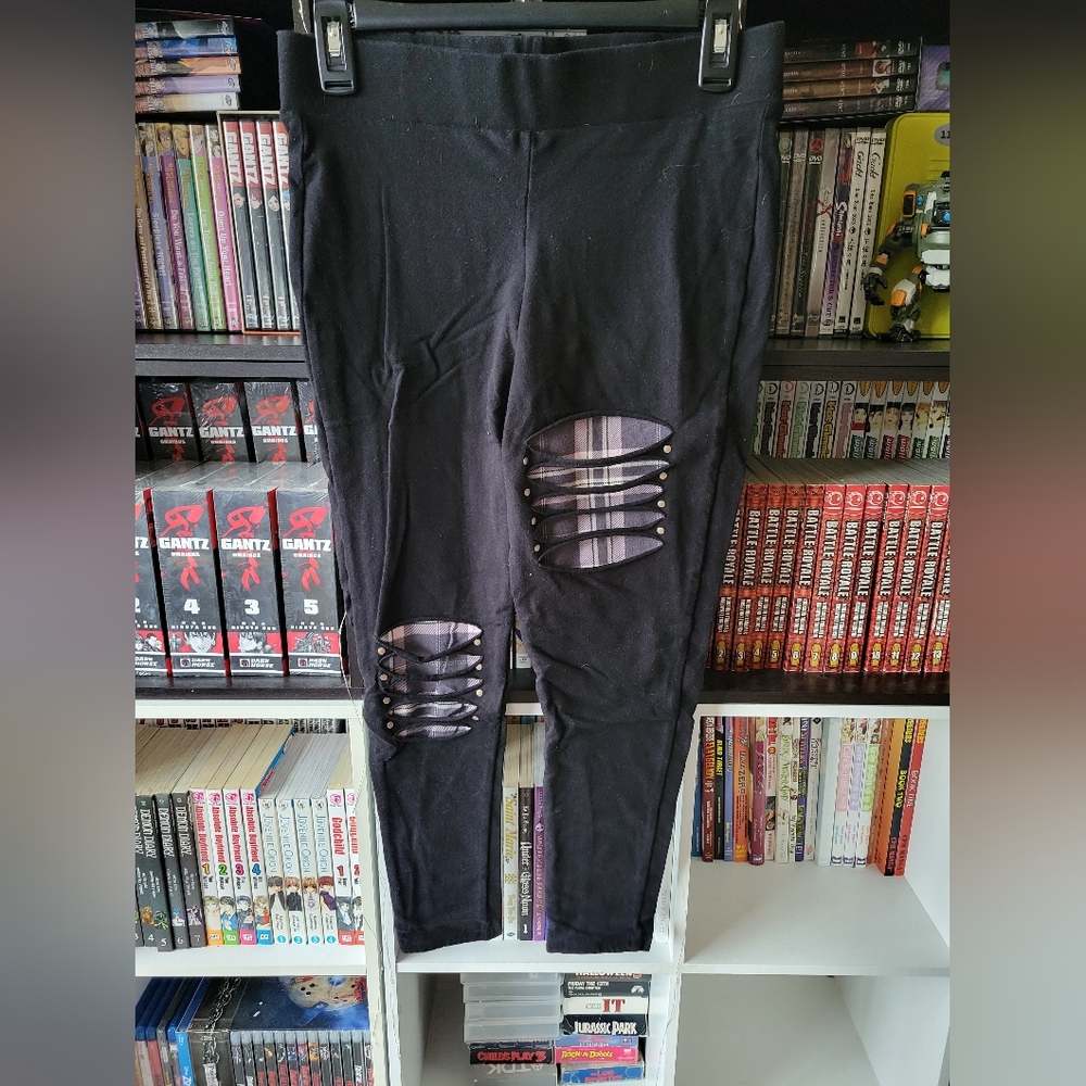 Torrid leggings with plaid cut outs in size 0